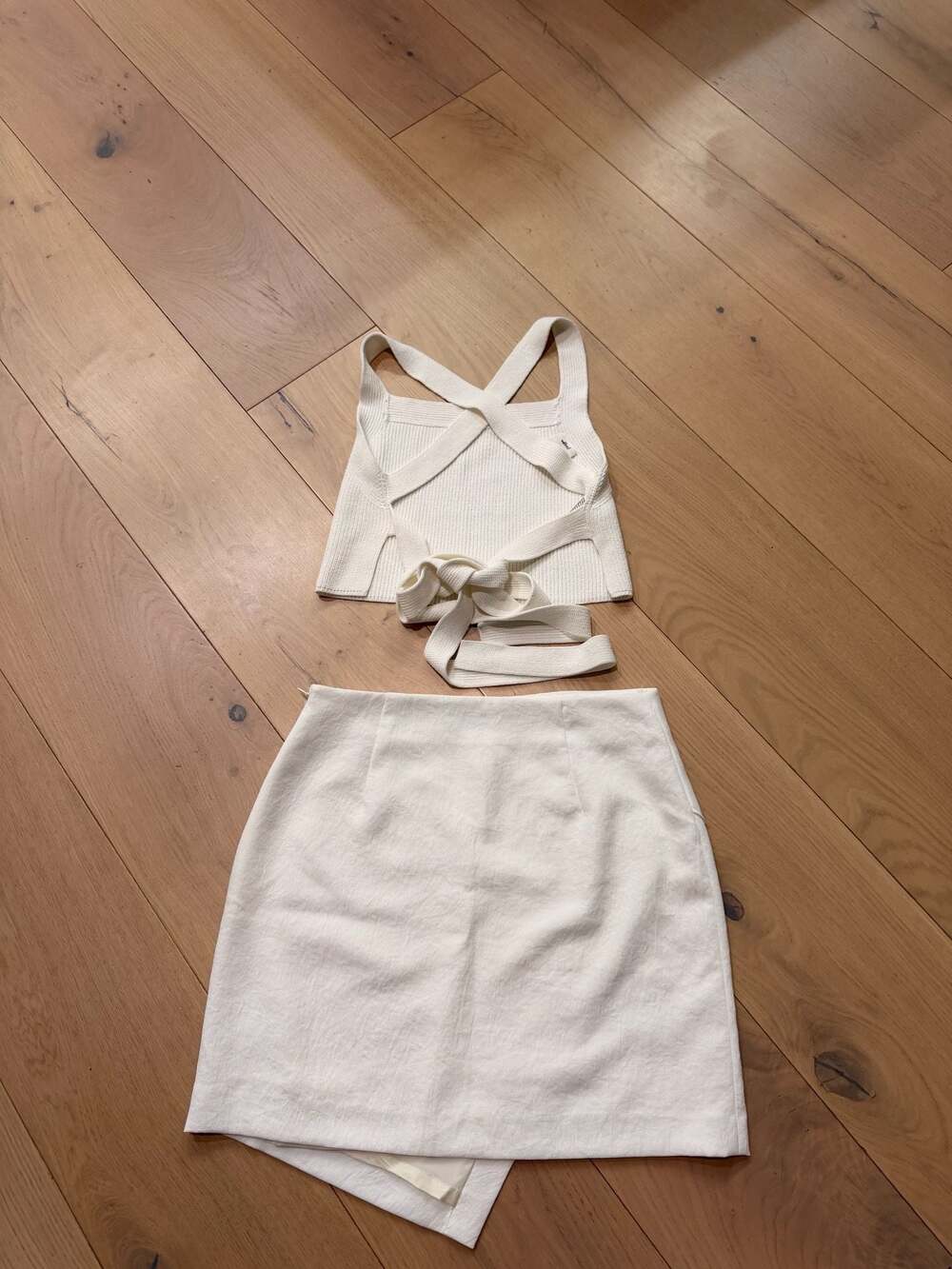 Babaton Wilfred Two-Piece Criss-Cross Knit Crop Top and Asymmetrical Skirt Set - Picture 2 of 11